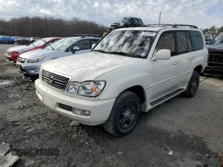 2001 Lexus LX 470 with VIN JTJHT00W013503264, listed as a Copart auction lot 86585084 with 308,384 mi miles and Salvage Title. Bid and sale history available at carsss.com. Image 1.