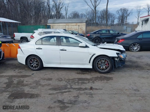 2014 Mitsubishi Lancer Evolution MR with VIN JA32W5FV5EU017592, listed as a IAAI auction lot 41158408 with 97614 miles. Bid and sale history available at carsss.com. Image 14.