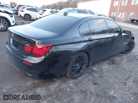 2015 BMW 7 Series 740Li xDrive with VIN WBAYF4C51FGS99074, listed as a IAAI auction lot 41222498 with 132,789 mi miles. Bid and sale history available at carsss.com. Image 4.