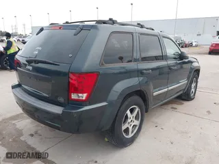 2005 Jeep Grand Cherokee Laredo with VIN 1J4GS48K45C677011, listed as a IAAI auction lot 41121018 with 210,814 mi miles. Bid and sale history available at carsss.com. Image 4.