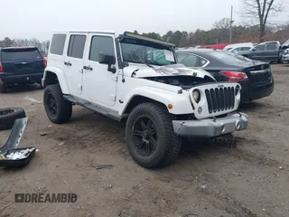 2015 Jeep Wrangler Unlimited Wrangler X z VIN 1C4BJWEGXFL713140, wystawiony jako IAAI lot #41227001 z przebiegiem 125 504 mil mil oraz . Historia ofert i sprzedaży dostępna na DreamBid. Obrazek 1.