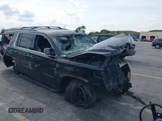 2018 Chevrolet Suburban LT with VIN 1GNSKHKCXJR356680, listed as a IAAI auction lot 41867318 with 332,052 mi miles. Bid and sale history available at carsss.com. Image 1.