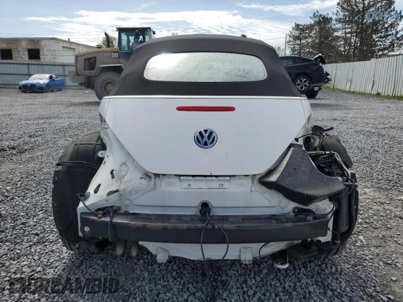 2010 Volkswagen Beetle with VIN 3VWRG3AL6AM010041, listed as a Copart auction lot 54915045 with 95,719 mi miles and Salvage Title. Bid and sale history available at DreamBid. Image 6.
