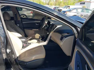 2014 Hyundai Elantra GT with VIN KMHD35LH5EU171569, listed as a IAAI auction lot 41882896 with 181,989 mi miles. Bid and sale history available at carsss.com. Image 5.