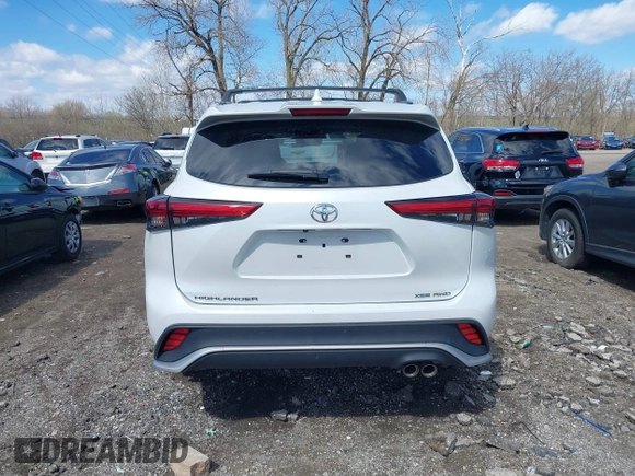 2022 Toyota Highlander XSE with VIN 5TDLZRBH0NS235559, listed as a IAAI auction lot 41684126 with 23,671 mi miles and . Bid and sale history available at DreamBid. Image 16.