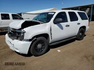 2012 Chevrolet Tahoe Commercial with VIN 1GNLC2E09CR234329, listed as a Copart auction lot 55769605 with 92,876 mi miles and Salvage title. Bid and sale history available at DreamBid. Image 1.