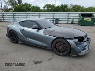2022 Toyota Supra 3.0 with VIN WZ1DB0C09NW047931, listed as a Copart auction lot 59527955 with 61,941 mi miles and Salvage title. Bid and sale history available at DreamBid. Image 4.