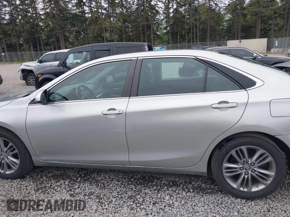 2015 Toyota Camry XLE with VIN 4T1BF1FK0FU028772, listed as a IAAI auction lot 42235029 with 75,285 mi miles and . Bid and sale history available at DreamBid. Image 14.