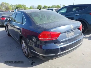 2013 Volkswagen Passat TDI SEL Premium with VIN 1VWCN7A33DC125396, listed as a IAAI auction lot 41862605 with 123,542 mi miles. Bid and sale history available at carsss.com. Image 3.