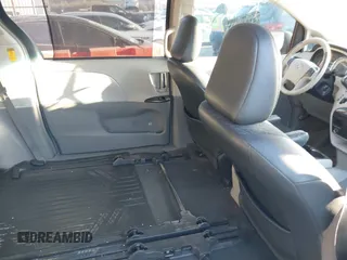 2014 Toyota Sienna SE with VIN 5TDXK3DC1ES462473, listed as a IAAI auction lot 41811437 with 209,704 mi miles and . Bid and sale history available at DreamBid. Image 8.