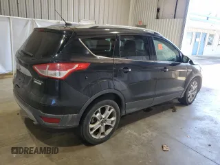 2016 Ford Escape Titanium with VIN 1FMCU0J91GUB09161, listed as a Copart auction lot 50027315 with 106,784 mi miles and Salvage Title. Bid and sale history available at carsss.com. Image 3.