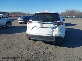 2016 Mazda CX-9 Touring with VIN JM3TCBCY5G0122551, listed as a IAAI auction lot 41613683 with 137,474 mi miles. Bid and sale history available at carsss.com. Image 16.