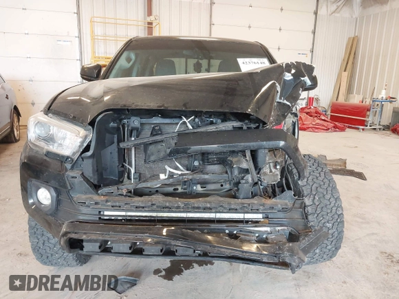 2017 Toyota Tacoma SR5 with VIN 5TFCZ5AN0HX053441, listed as a IAAI auction lot 42376148 with 100,996 mi miles and . Bid and sale history available at DreamBid. Image 6.