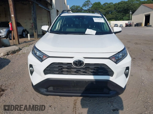 2019 Toyota RAV4 XLE with VIN JTMP1RFV0KD020442, listed as a IAAI auction lot 40108049 with 70,916 mi miles and . Bid and sale history available at DreamBid. Image 6.
