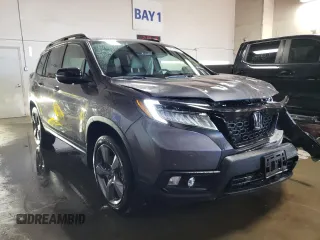 2021 Honda Passport Touring with VIN 5FNYF8H98MB012326, listed as a Copart auction lot 52165835 with 21,679 mi miles and Salvage Title. Bid and sale history available at carsss.com. Image 4.
