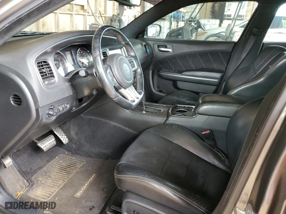 2012 Dodge Charger SRT8 with VIN 2C3CDXEJ1CH240058, listed as a Copart auction lot 73943004 with 72,013 mi miles and Salvage Title. Bid and sale history available at carsss.com. Image 7.