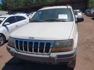 2002 Jeep Grand Cherokee Laredo with VIN 1J4GX48S32C134911, listed as a IAAI auction lot 42323138 with 156,852 mi miles and . Bid and sale history available at DreamBid. Image 6.