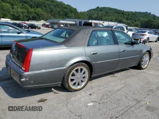 2007 Cadillac DTS V8 z VIN 1G6KD57Y67U136984, wystawiony jako Copart lot #65570084 z przebiegiem 114 814 mil mil oraz Szkoda całkowita • Salvage title. Historia ofert i sprzedaży dostępna na DreamBid. Obrazek 3.