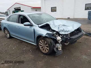 2013 Volkswagen Passat SEL Premium z VIN 1VWCP7A38DC058627, wystawiony jako IAAI lot #41687690 z przebiegiem 192 322 mil mil oraz . Historia ofert i sprzedaży dostępna na DreamBid. Obrazek 1.