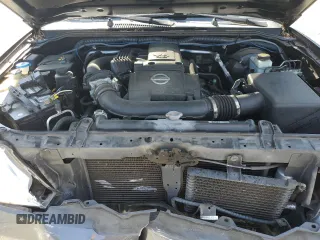 2011 Nissan Pathfinder SV z VIN 5N1AR1NB3BC618372, wystawiony jako Copart lot #60319365 z przebiegiem 91 251 mil mil oraz Szkoda całkowita • Salvage title. Historia ofert i sprzedaży dostępna na DreamBid. Obrazek 12.