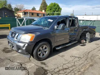 2014 Nissan Titan S with VIN 1N6AA0EC3EN507244, listed as a Copart auction lot 57502005 with 121,509 mi miles and Salvage title. Bid and sale history available at DreamBid. Image 1.