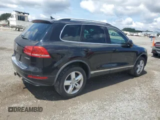 2011 Volkswagen Touareg z VIN WVGFG9BP5BD002225, wystawiony jako Copart lot #59926795 z przebiegiem 154 212 mil mil oraz Czysty tytuł • Clean title. Historia ofert i sprzedaży dostępna na DreamBid. Obrazek 3.