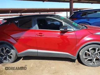 2019 Toyota C-HR XLE with VIN JTNKHMBX8K1032206, listed as a IAAI auction lot 41852134 with 136,107 mi miles. Bid and sale history available at carsss.com. Image 13.