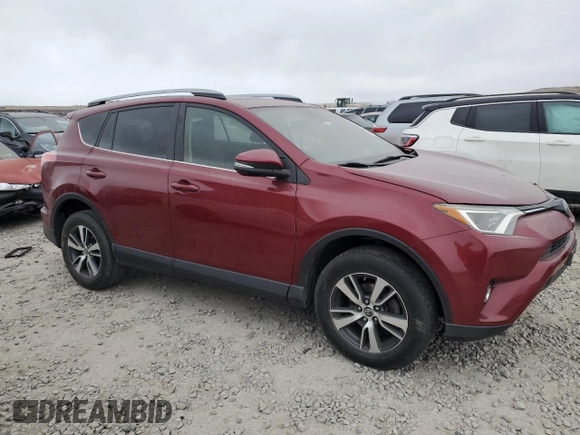 2018 Toyota RAV4 XLE with VIN JTMRFREV7JD252112, listed as a Copart auction lot 43088555 with 77,509 mi miles and Salvage Title. Bid and sale history available at carsss.com. Image 4.