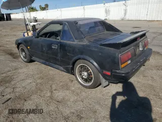 1986 Toyota MR2 z VIN JT2AW15C8G0053673, wystawiony jako Copart lot #88160225 z przebiegiem 165 867 mil mil oraz Szkody całkowita. Historia ofert i sprzedaży dostępna na DreamBid. Obrazek 2.