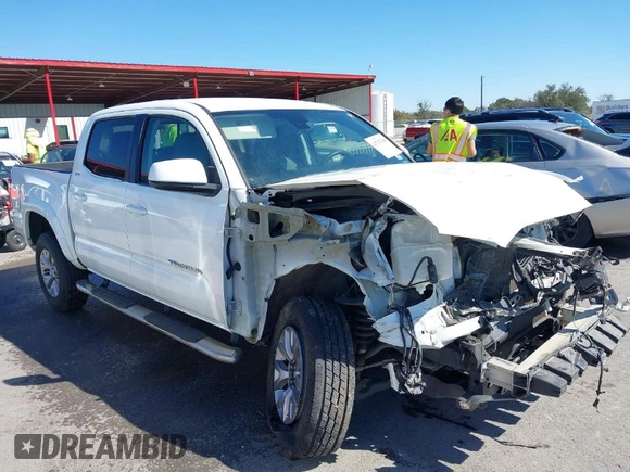 2018 Toyota Tacoma SR5 with VIN 5TFAZ5CN4JX056465, listed as a IAAI auction lot 41767848 with 71,532 mi miles and . Bid and sale history available at DreamBid. Image 1.