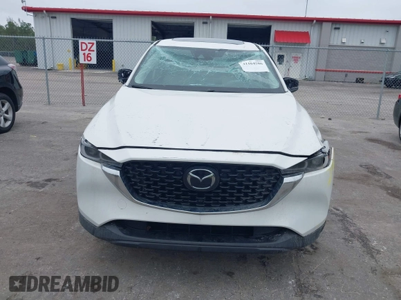 2023 Mazda CX-5 2.5 S Premium Package with VIN JM3KFBDM1P0126787, listed as a IAAI auction lot 41164586 with 12,076 mi miles. Bid and sale history available at carsss.com. Image 12.