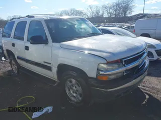 2001 Chevrolet Tahoe LS z VIN 1GNEC13T51J138600, wystawiony jako IAAI lot #41564851 z przebiegiem 139 468 mil mil oraz . Historia ofert i sprzedaży dostępna na DreamBid. Obrazek 1.