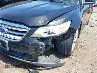 2011 Ford Taurus SEL with VIN 1FAHP2EW6BG127102, listed as a IAAI auction lot 42131123 with 168,965 mi miles. Bid and sale history available at carsss.com. Image 6.