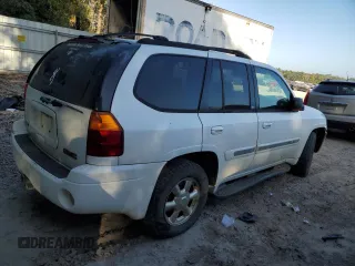 2002 GMC Envoy SLT with VIN 1GKDS13S822460095, listed as a Copart auction lot 77004764 with 267,716 mi miles and Salvage Title. Bid and sale history available at carsss.com. Image 3.