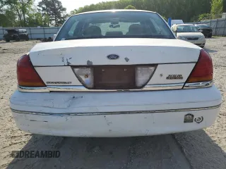 2003 Ford Crown Victoria LX z VIN 2FAFP74W03X209148, wystawiony jako Copart lot #53274575 z przebiegiem 127 739 mil mil oraz Szkody całkowita. Historia ofert i sprzedaży dostępna na DreamBid. Obrazek 6.