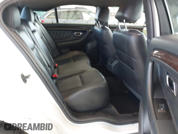 2015 Ford Taurus Limited with VIN 1FAHP2J81FG118224, listed as a IAAI auction lot 42402947 with 142,885 mi miles and . Bid and sale history available at DreamBid. Image 8.