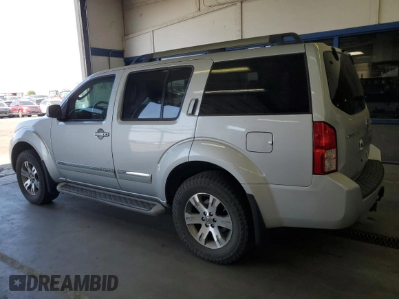 2012 Nissan Pathfinder Silver Edition z VIN 5N1AR1NB7CC629750, wystawiony jako Copart lot #61209965 z przebiegiem 164 479 mil mil oraz Szkoda całkowita • Salvage title. Historia ofert i sprzedaży dostępna na DreamBid. Obrazek 2.