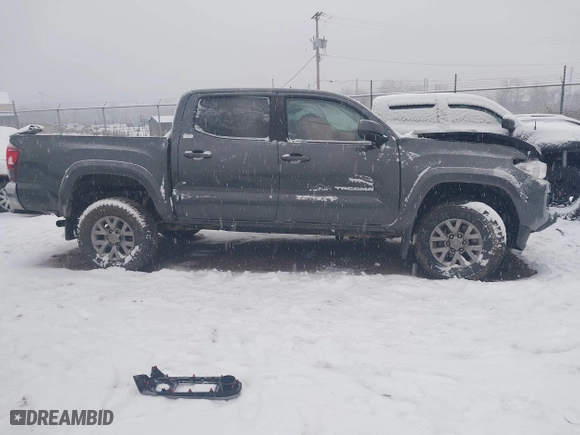 2019 Toyota Tacoma 4WD SR with VIN 3TMCZ5AN6KM283675, listed as a IAAI auction lot 41245232 with 35,337 mi miles. Bid and sale history available at carsss.com. Image 14.
