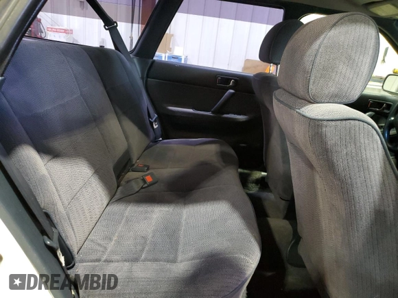 1994 Subaru Legacy L with VIN 4S3BJ6335R9948773, listed as a Copart auction lot 77018384 with 189,202 mi miles and Clean title. Bid and sale history available at DreamBid. Image 12.