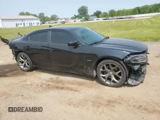 2016 Dodge Charger R/T with VIN 2C3CDXCT4GH303356, listed as a Copart auction lot 59140015 with 128,049 mi miles and Salvage title. Bid and sale history available at DreamBid. Image 4.