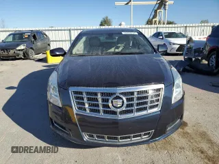 2014 Cadillac XTS z VIN 2G61L5S39E9300636, wystawiony jako Copart lot #78068634 z przebiegiem 117 549 mil mil oraz Szkody całkowita. Historia ofert i sprzedaży dostępna na DreamBid. Obrazek 5.