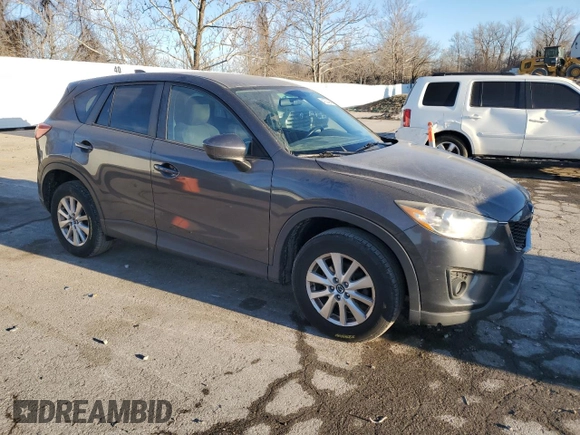 2015 Mazda CX-5 Touring with VIN JM3KE2CY0F0439125, listed as a Copart auction lot 43324945 with 210,404 mi miles and Clean Title. Bid and sale history available at DreamBid. Image 4.