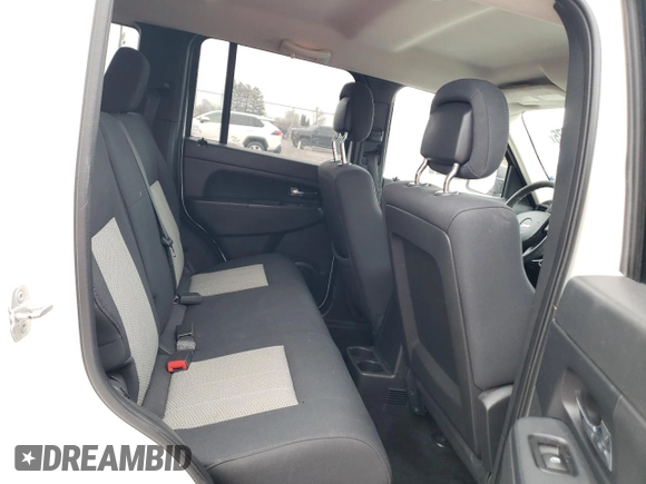 2010 Jeep Liberty Sport with VIN 1J4PP2GK9AW133958, listed as a Copart auction lot 47265675 with 124,466 mi miles and Salvage Title. Bid and sale history available at DreamBid. Image 11.