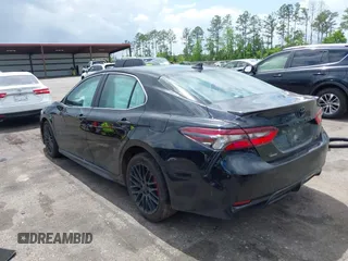 2023 Toyota Camry SE with VIN 4T1G11AK6PU829509, listed as a IAAI auction lot 42009085 with 35,864 mi miles and . Bid and sale history available at DreamBid. Image 3.