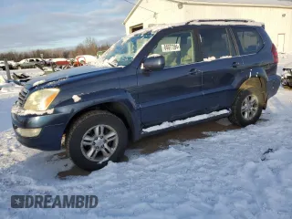 2004 Lexus GX 470 with VIN JTJBT20X040031020, listed as a Copart auction lot 84077394 with 220,740 mi miles and Clean Title. Bid and sale history available at carsss.com. Image 1.