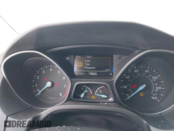 2015 Ford Focus SE with VIN 1FADP3F23FL361274, listed as a IAAI auction lot 41292796 with 102,741 mi miles. Bid and sale history available at carsss.com. Image 7.