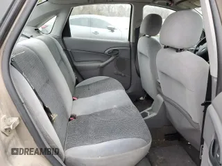 2003 Ford Focus LX with VIN 1FAFP33P73W114861, listed as a Copart auction lot 44859405 with 100,574 mi miles and Salvage Title. Bid and sale history available at carsss.com. Image 10.
