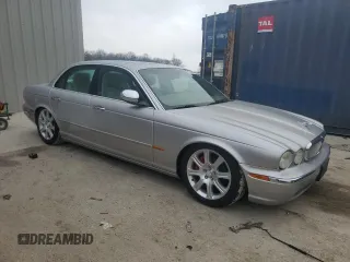 2004 Jaguar XJ with VIN SAJEA74C64SG08121, listed as a Copart auction lot 81736984 with 100,144 mi miles and Non Repairable. Bid and sale history available at DreamBid. Image 4.