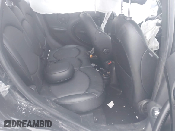 2016 MINI Countryman S with VIN WMWZC3C56GWT11105, listed as a IAAI auction lot 41228246 with 102,971 mi miles and . Bid and sale history available at DreamBid. Image 8.