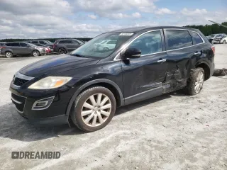 2010 Mazda CX-9 Grand Touring with VIN JM3TB2MA5A0227618, listed as a Copart auction lot 58193095 with 220,560 mi miles and Salvage title. Bid and sale history available at DreamBid. Image 1.